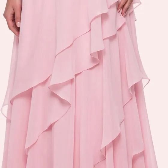 Asymmetric ruffle tiers on the skirt